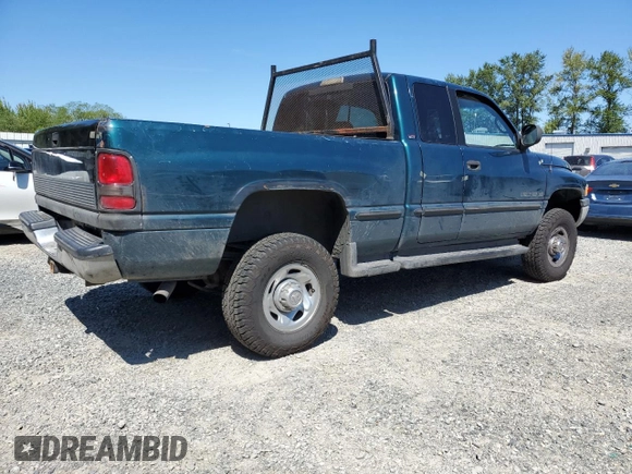 1999 Dodge 2500 with VIN 1B7KF23W2XJ539940, listed as a Copart auction lot 64237595 with 211,718 mi miles and Salvage title. Bid and sale history available at DreamBid. Image 3.
