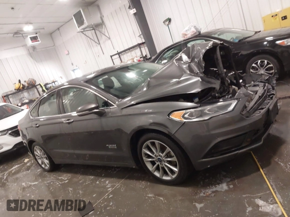 2018 Ford Fusion Energi SE with VIN 3FA6P0PU3JR203714, listed as a IAAI auction lot 41698507 with 168,609 mi miles. Bid and sale history available at carsss.com. Image 12.