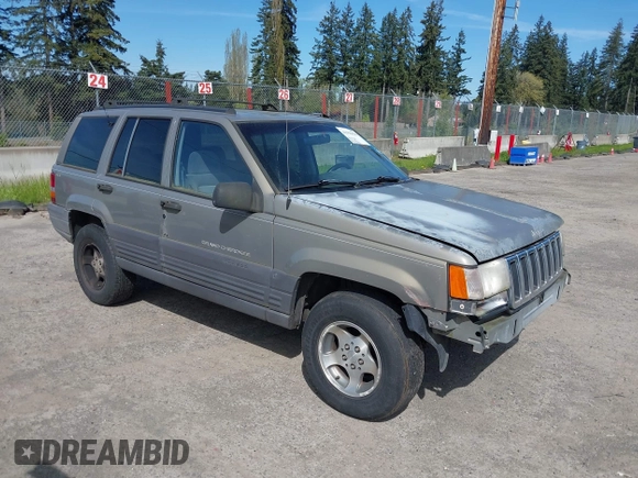 1997 Jeep Grand Cherokee Laredo with VIN 1J4GZ58S5VC500257, listed as a IAAI auction lot 41996034 with 222,513 mi miles and . Bid and sale history available at DreamBid. Image 1.