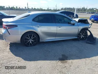 2022 Toyota Camry SE with VIN 4T1T11AK9NU686020, listed as a IAAI auction lot 41155558 with 46,746 mi miles and . Bid and sale history available at DreamBid. Image 4.
