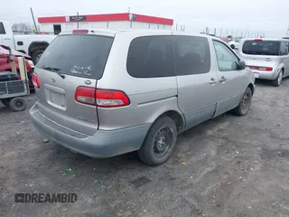 2001 Toyota Sienna CE with VIN 4T3ZF19C21U362689, listed as a IAAI auction lot 41535447 with 239,147 mi miles. Bid and sale history available at carsss.com. Image 4.