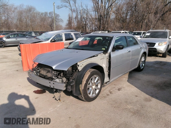 2007 Chrysler 300 Touring with VIN 2C3LA53G57H785979, listed as a IAAI auction lot 36241614 with 220,841 mi miles. Bid and sale history available at carsss.com. Image 2.