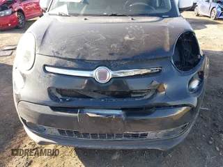 2014 FIAT 500L Easy with VIN ZFBCFABH1EZ002527, listed as a IAAI auction lot 41451693 with 133,488 mi miles and . Bid and sale history available at DreamBid. Image 6.