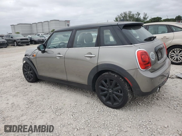 2019 MINI Hardtop 4 Door Cooper with VIN WMWXU1C53K2J02056, listed as a Copart auction lot 76686314 with 44,471 mi miles and Salvage Title. Bid and sale history available at DreamBid. Image 2.