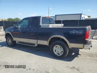 2000 Ford F-150 XL with VIN 1FTRX18L0YNB65908, listed as a Copart auction lot 54797585 with 298,924 mi miles and Clean title. Bid and sale history available at DreamBid. Image 2.
