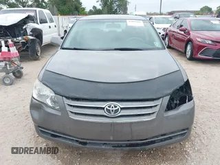 2006 Toyota Avalon XL with VIN 4T1BK36B76U156904, listed as a IAAI auction lot 42005667 with 115,195 mi miles. Bid and sale history available at carsss.com. Image 13.