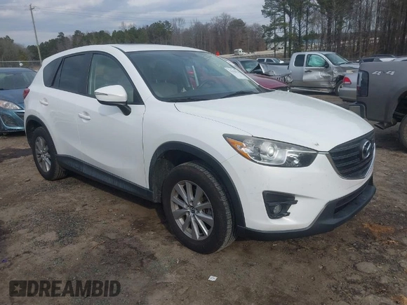2016 Mazda CX-5 Touring with VIN JM3KE2CY5G0791537, listed as a IAAI auction lot 41396276 with 42,095 mi miles. Bid and sale history available at carsss.com. Image 1.
