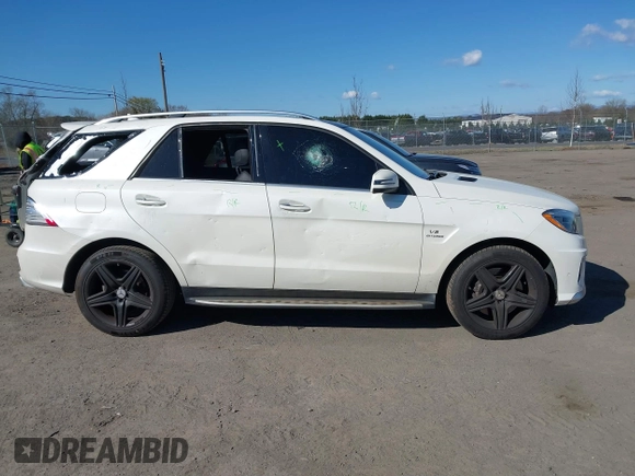 2014 Mercedes-Benz M 63 AMG z VIN 4JGDA7EB2EA339177, wystawiony jako IAAI lot #41883758 z przebiegiem 111 416 mil mil oraz . Historia ofert i sprzedaży dostępna na DreamBid. Obrazek 13.