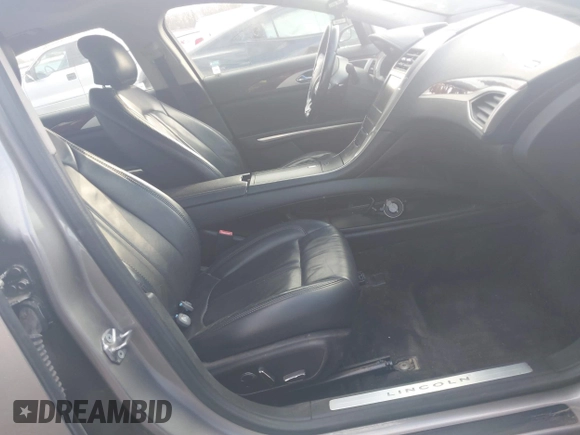 2015 Lincoln MKZ with VIN 3LN6L2J98FR620089, listed as a IAAI auction lot 41805555 with Not provided miles and . Bid and sale history available at DreamBid. Image 5.