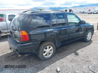 2005 GMC Envoy SLE with VIN 1GKDT13S552212811, listed as a IAAI auction lot 41996953 with 147,896 mi miles. Bid and sale history available at carsss.com. Image 4.
