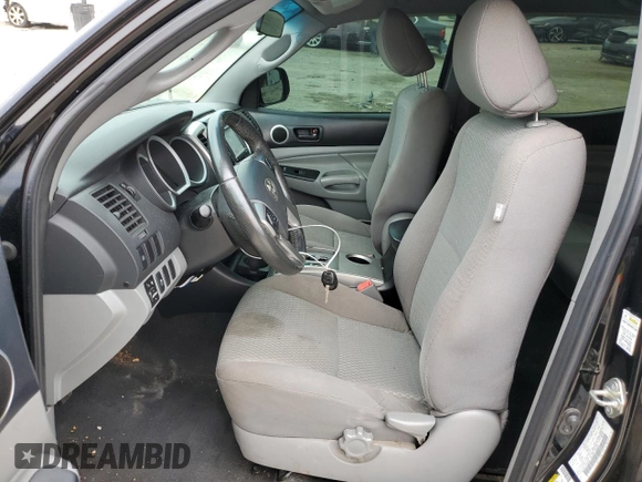 2015 Toyota Tacoma PreRunner с VIN 3TMJU4GNXFM175010, выставлен на аукционе Copart как лот 58418735 с пробегом 166 938 миль миль и Списание • Salvage title. История ставок и продаж доступна на DreamBid. Изображение 7.