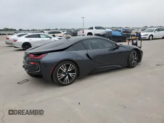2015 BMW i8 z VIN WBY2Z2C50FV674256, wystawiony jako Copart lot #56895134 z przebiegiem 33 484 mil mil oraz Szkody całkowita. Historia ofert i sprzedaży dostępna na DreamBid. Obrazek 3.