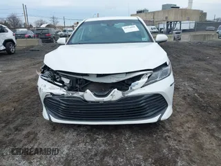 2020 Toyota Camry LE with VIN 4T1C11AK9LU912585, listed as a IAAI auction lot 41711816 with 142,751 mi miles. Bid and sale history available at carsss.com. Image 6.