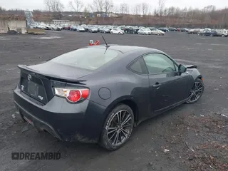 2014 Scion FR-S with VIN JF1ZNAA1XE9706469, listed as a IAAI auction lot 41942773 with 74,641 mi miles and . Bid and sale history available at DreamBid. Image 4.