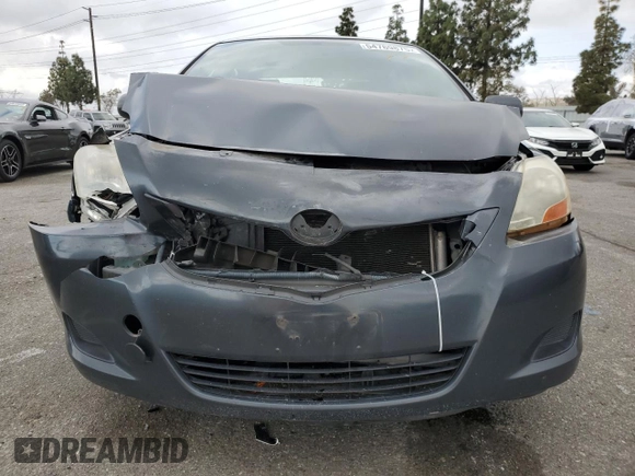 2009 Toyota Yaris with VIN JTDBT903291324461, listed as a Copart auction lot 54769875 with 141,777 mi miles and Salvage Title. Bid and sale history available at DreamBid. Image 5.
