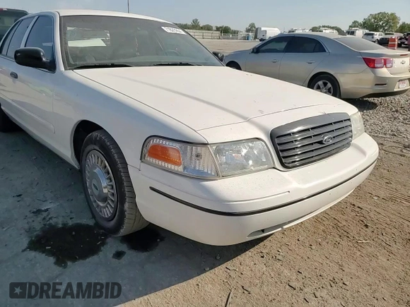 1999 Ford Crown Victoria Police z VIN 2FAFP71W7XX156457, wystawiony jako Copart lot #71623954 z przebiegiem 123 313 mil mil oraz Szkody całkowita. Historia ofert i sprzedaży dostępna na DreamBid. Obrazek 10.