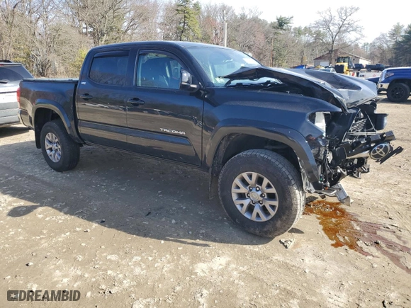 2019 Toyota Tacoma 4WD SR with VIN 3TMCZ5AN7KM213103, listed as a Copart auction lot 52088505 with 79,926 mi miles and Salvage Title. Bid and sale history available at carsss.com. Image 4.