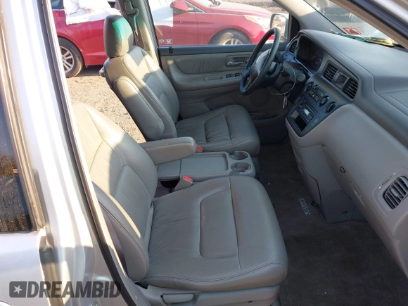 2004 Honda Odyssey EX-L with VIN 5FNRL18964B025323, listed as a IAAI auction lot 40714457 with 164,786 mi miles and . Bid and sale history available at DreamBid. Image 5.