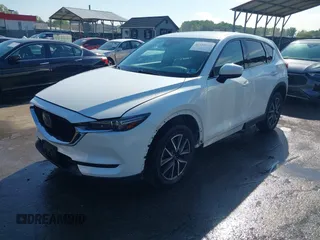 2018 Mazda CX-5 Grand Touring z VIN JM3KFBDM8J0420422, wystawiony jako IAAI lot #42188348 z przebiegiem 102 216 mil mil oraz . Historia ofert i sprzedaży dostępna na DreamBid. Obrazek 2.
