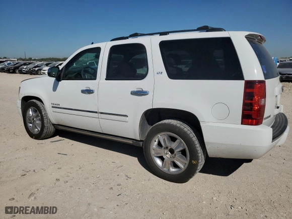 2010 Chevrolet Tahoe LTZ with VIN 1GNUCCE01AR115116, listed as a Copart auction lot 73654244 with 149,345 mi miles and Salvage Title. Bid and sale history available at carsss.com. Image 2.