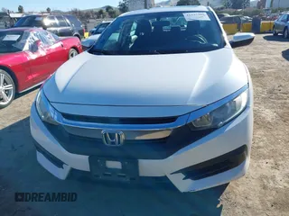 2017 Honda Civic EX z VIN 19XFC2F76HE202300, wystawiony jako IAAI lot #41337380 z przebiegiem 165 235 mil mil oraz . Historia ofert i sprzedaży dostępna na DreamBid. Obrazek 13.