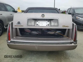 1995 Cadillac Concours z VIN 1G6KF52Y6SU244970, wystawiony jako Copart lot #75079524 z przebiegiem Nie podano mil oraz Szkody całkowita. Historia ofert i sprzedaży dostępna na DreamBid. Obrazek 6.