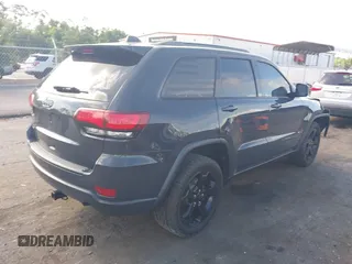 2018 Jeep Grand Cherokee Altitude with VIN 1C4RJFAG7JC394051, listed as a IAAI auction lot 42492771 with 147,669 mi miles and . Bid and sale history available at DreamBid. Image 4.