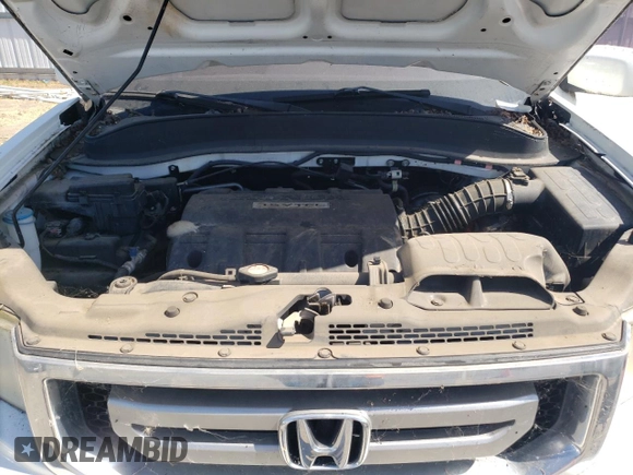 2010 Honda Ridgeline RTL with VIN 5FPYK1F56AB004084, listed as a Copart auction lot 58538224 with 97,558 mi miles and Salvage Title. Bid and sale history available at carsss.com. Image 11.