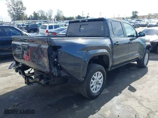 2024 Toyota Tacoma 4WD SR5 with VIN 3TMLB5JN7RM022456, listed as a IAAI auction lot 41430159 with 6,058 mi miles. Bid and sale history available at carsss.com. Image 4.