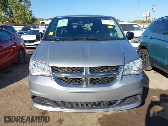 2020 Dodge Grand Caravan SE with VIN 2C4RDGBG9LR198425, listed as a IAAI auction lot 40672143 with 61,473 mi miles and . Bid and sale history available at DreamBid. Image 12.