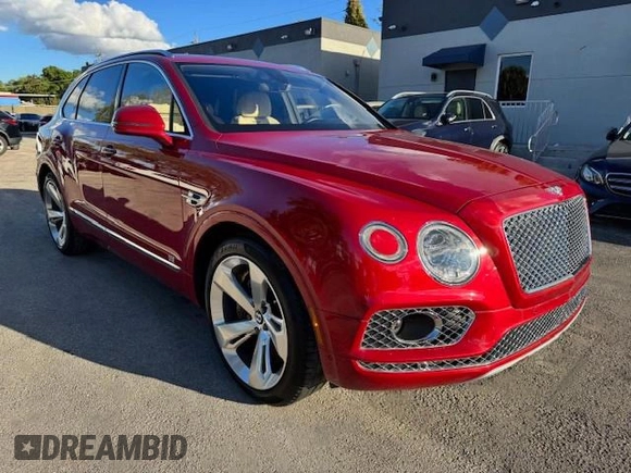 2017 Bentley Bentayga W12 z VIN SJAAC2ZV1HC014037, wystawiony jako Copart lot #54799655 z przebiegiem 36 099 mil mil oraz Szkody całkowita. Historia ofert i sprzedaży dostępna na DreamBid. Obrazek 4.