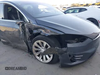 2018 Tesla Model X 75D with VIN 5YJXCDE28JF142509, listed as a IAAI auction lot 41993444 with 100,244 mi miles and . Bid and sale history available at carsss.com. Image 6.