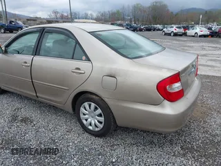 2004 Toyota Camry LE with VIN 4T1BE32K94U347539, listed as a IAAI auction lot 41957246 with 234,747 mi miles and . Bid and sale history available at carsss.com. Image 3.