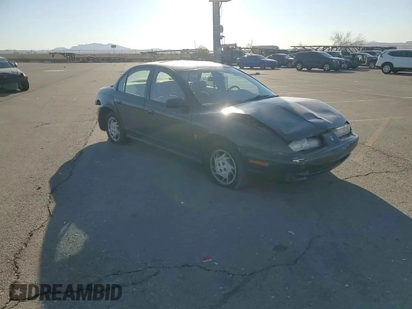 1996 Saturn SL with VIN 1G8ZK5272TZ137198, listed as a Copart auction lot 72446614 with 99,586 mi miles and Salvage title. Bid and sale history available at DreamBid. Image 11.