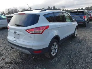 2016 Ford Escape SE z VIN 1FMCU9G96GUC15858, wystawiony jako IAAI lot #41799156 z przebiegiem 162 033 mil mil oraz . Historia ofert i sprzedaży dostępna na DreamBid. Obrazek 4.