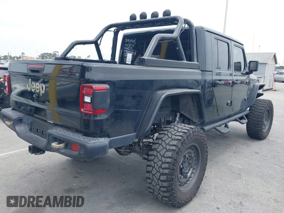 2020 Jeep Gladiator Rubicon z VIN 1C6JJTBG7LL102189, wystawiony jako IAAI lot #42320968 z przebiegiem 68 266 mil mil oraz . Historia ofert i sprzedaży dostępna na DreamBid. Obrazek 4.