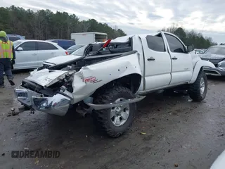 2009 Toyota Tacoma PreRunner with VIN 3TMJU62N59M082788, listed as a IAAI auction lot 41297385 with 253,581 mi miles. Bid and sale history available at carsss.com. Image 4.