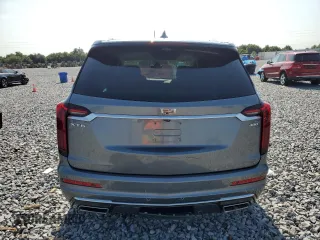 2021 Cadillac XT6 Premium Luxury z VIN 1GYKPCRS5MZ197527, wystawiony jako Copart lot #55952185 z przebiegiem 24 856 mil mil oraz Szkody całkowita. Historia ofert i sprzedaży dostępna na DreamBid. Obrazek 6.