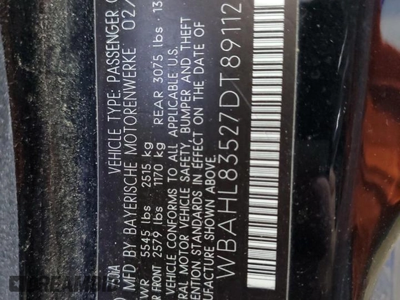 2007 BMW 7 Series 750i with VIN WBAHL83527DT89112, listed as a Copart auction lot 52806635 with 174,758 mi miles and Salvage title. Bid and sale history available at DreamBid. Image 12.