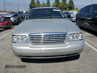 2004 Ford Crown Victoria LX с VIN 2FAFP74W44X184918, выставлен на аукционе Copart как лот 73346744 с пробегом 157 925 миль миль и Списание • Salvage title. История ставок и продаж доступна на DreamBid. Изображение 5.