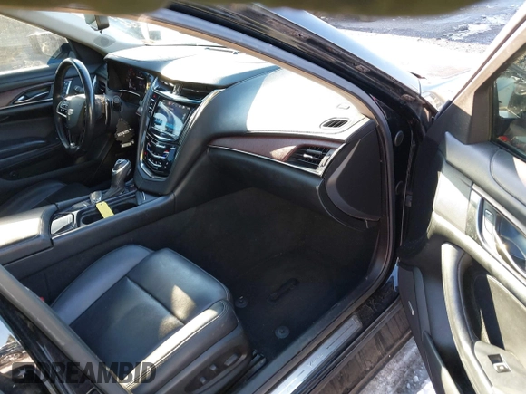 2017 Cadillac CTS Luxury AWD z VIN 1G6AX5SX7H0176310, wystawiony jako IAAI lot #41293373 z przebiegiem 161 264 mil mil oraz . Historia ofert i sprzedaży dostępna na DreamBid. Obrazek 5.