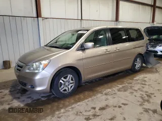 2007 Honda Odyssey EX-L with VIN 5FNRL38747B409907, listed as a Copart auction lot 52783605 with 151,225 mi miles and Salvage Title. Bid and sale history available at carsss.com. Image 1.