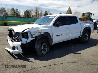 2023 Toyota Tacoma SR with VIN 3TMCZ5AN6PM614228, listed as a Copart auction lot 53317595 with 18,058 mi miles and Salvage title. Bid and sale history available at DreamBid. Image 1.