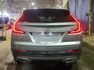 2023 Cadillac XT4 AWD Premium Luxury z VIN 1GYFZDR4XPF109449, wystawiony jako Copart lot #46712405 z przebiegiem 10 882 mil mil oraz Czysty tytuł • Clean title. Historia ofert i sprzedaży dostępna na DreamBid. Obrazek 6.