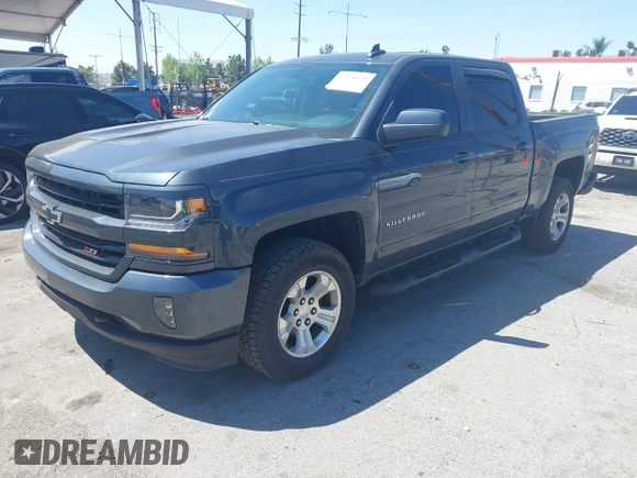 2018 Chevrolet Silverado 1500 LT with VIN 3GCUKREC1JG511846, listed as a IAAI auction lot 42024170 with 121,532 mi miles and . Bid and sale history available at DreamBid. Image 17.