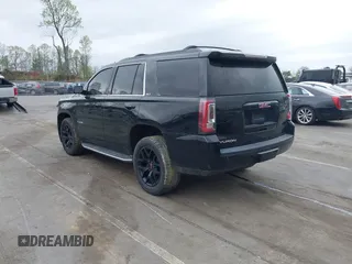 2017 GMC Yukon SLT with VIN 1GKS1BKC2HR128308, listed as a IAAI auction lot 41945770 with 158,905 mi miles. Bid and sale history available at carsss.com. Image 3.