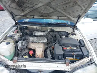 1992 Toyota Camry LE z VIN 4T1SK12E0NU021654, wystawiony jako IAAI lot #42305378 z przebiegiem 305 421 mil mil oraz . Historia ofert i sprzedaży dostępna na DreamBid. Obrazek 10.