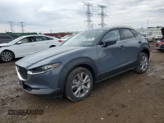 2021 Mazda CX-30 Premium with VIN 3MVDMBDL1MM306227, listed as a Copart auction lot 54202705 with 47,601 mi miles and Salvage title. Bid and sale history available at DreamBid. Image 1.
