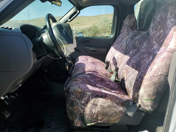 2004 Ford F-150 XL with VIN 2FTRF18W54CA36334, listed as a Copart auction lot 63464375 with 253,805 mi miles and Salvage title. Bid and sale history available at DreamBid. Image 7.