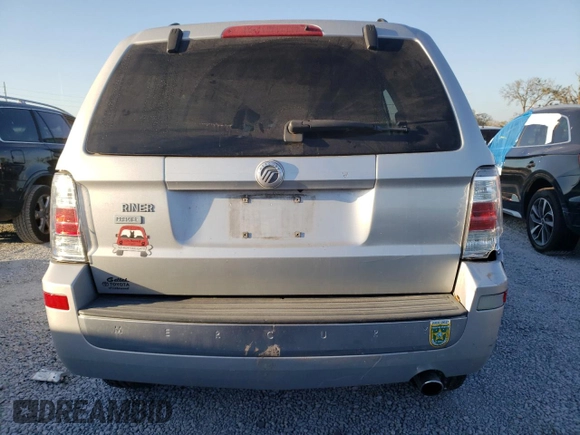 2009 Mercury Mariner Premier z VIN 4M2CU87789KJ23933, wystawiony jako Copart lot #45120455 z przebiegiem 104 465 mil mil oraz Szkody całkowita. Historia ofert i sprzedaży dostępna na DreamBid. Obrazek 6.